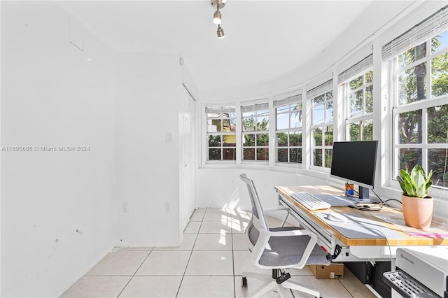 office space featuring light tile patterned floors