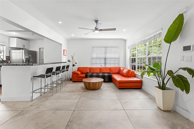 living room with ceiling fan