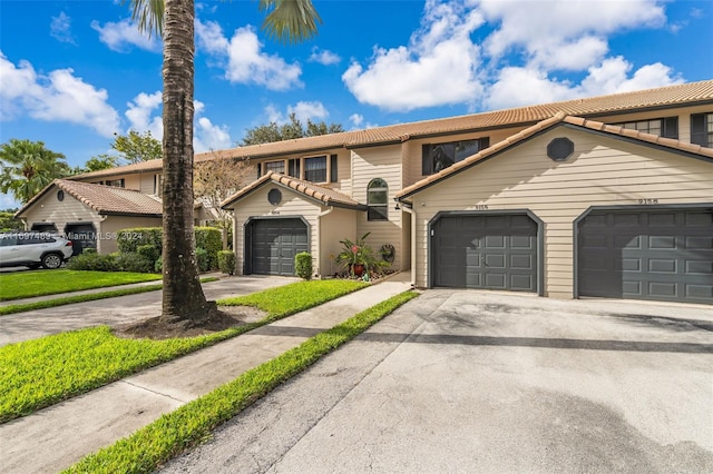 view of front of property with a garage