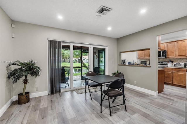 dining area featuring light hardwood / wood-style floors