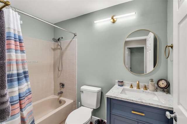 full bathroom featuring toilet, vanity, and shower / bath combination with curtain