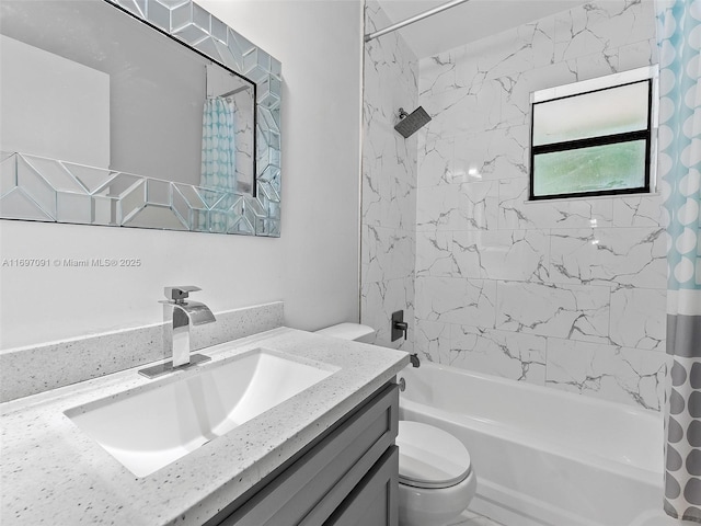 bathroom with toilet, shower / bath combo, and vanity