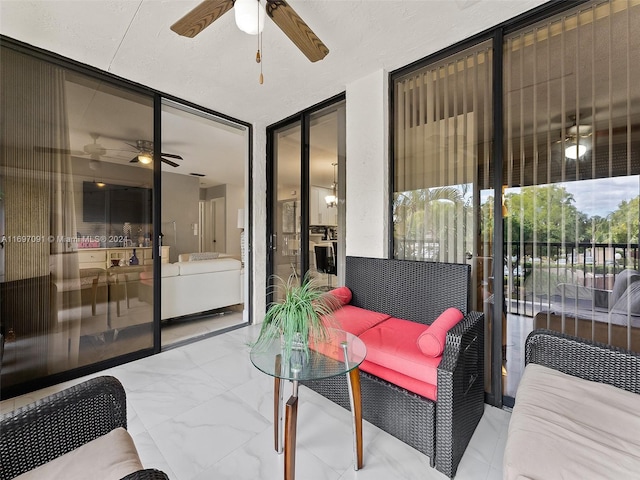 view of patio with ceiling fan