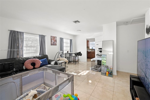 kitchen with light tile patterned flooring