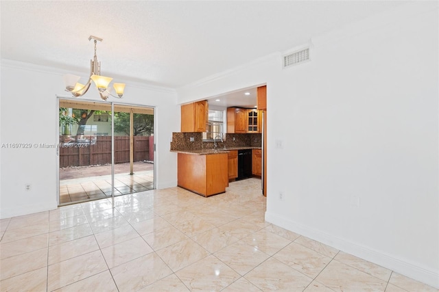 kitchen with backsplash, hanging light fixtures, ornamental molding, black dishwasher, and a notable chandelier