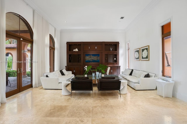 living room featuring ornamental molding and french doors