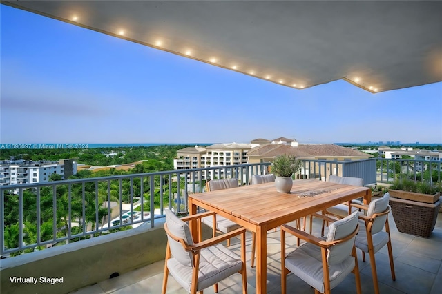 view of balcony at dusk