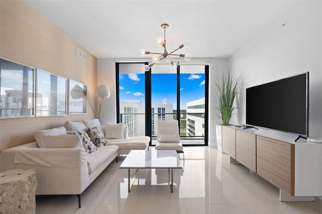 living room with expansive windows, light tile patterned flooring, and a notable chandelier