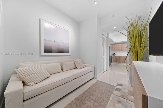 living room featuring light tile patterned flooring