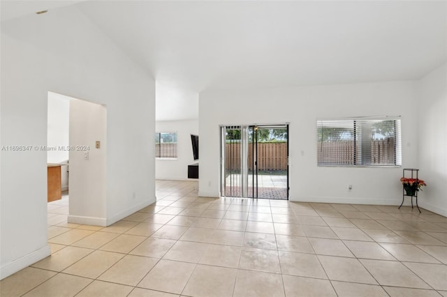 empty room with light tile patterned floors