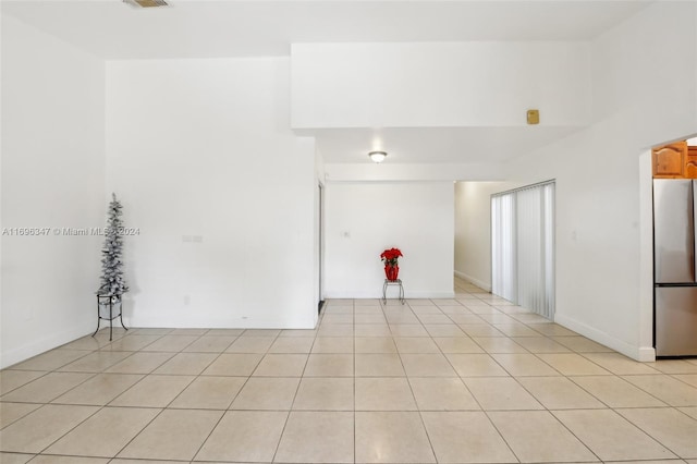 view of tiled spare room