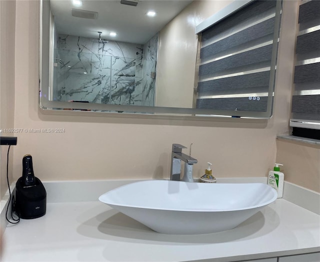 13380 SW 91st Ter Unit E, Miami, FL 33186 - bathroom featuring a marble finish shower and vanity