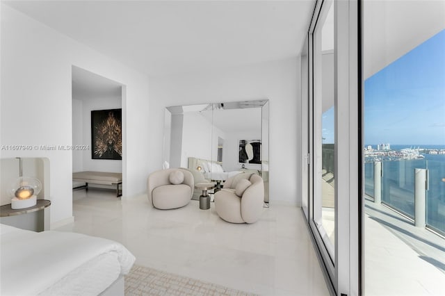 tiled bedroom featuring multiple windows