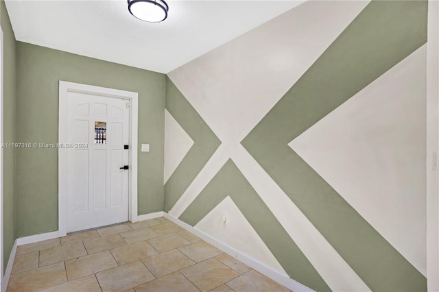 view of tiled foyer entrance