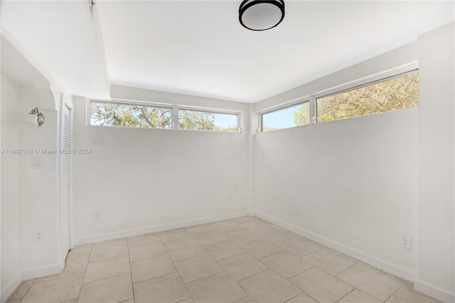 view of tiled spare room