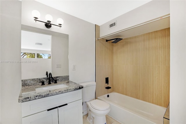 full bathroom with tile patterned floors, vanity, shower / bath combination, and toilet