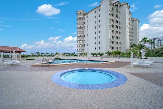 view of pool featuring a patio