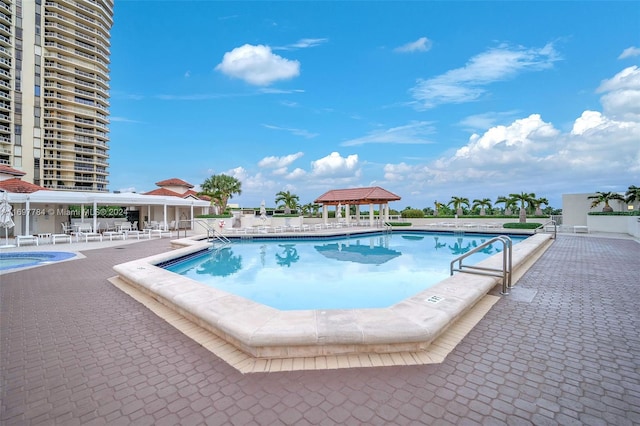 view of pool featuring a patio area