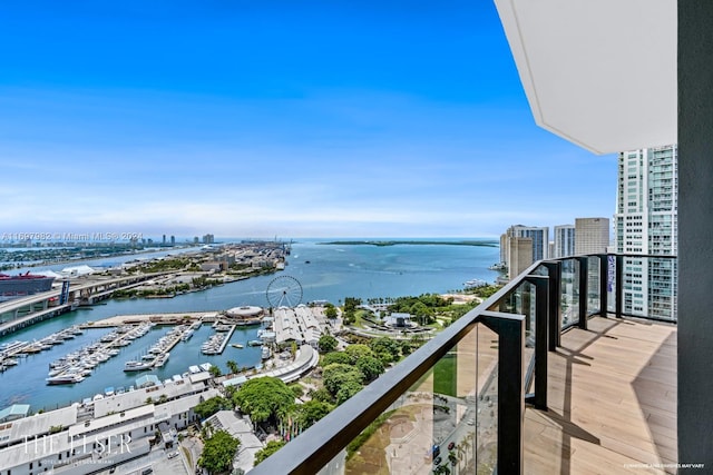 balcony featuring a water view