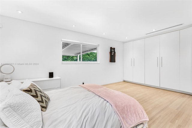 bedroom featuring light hardwood / wood-style flooring