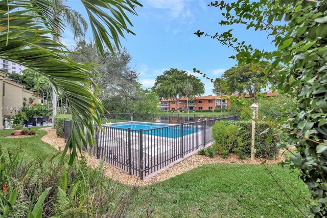 93 NE 17th Ct Unit 93, Fort Lauderdale, FL 33305 - community pool with a patio area
