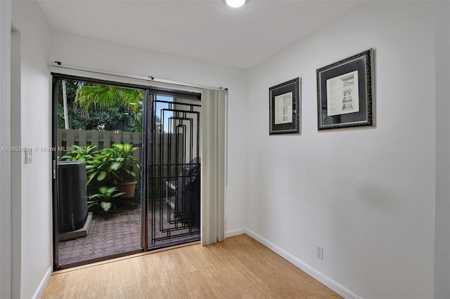 doorway with light hardwood / wood-style floors