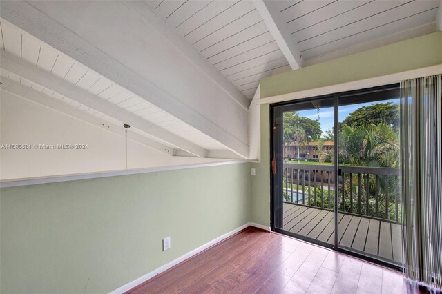 93 NE 17th Ct Unit 93, Fort Lauderdale, FL 33305 - spare room with wood finished floors and wooden ceiling