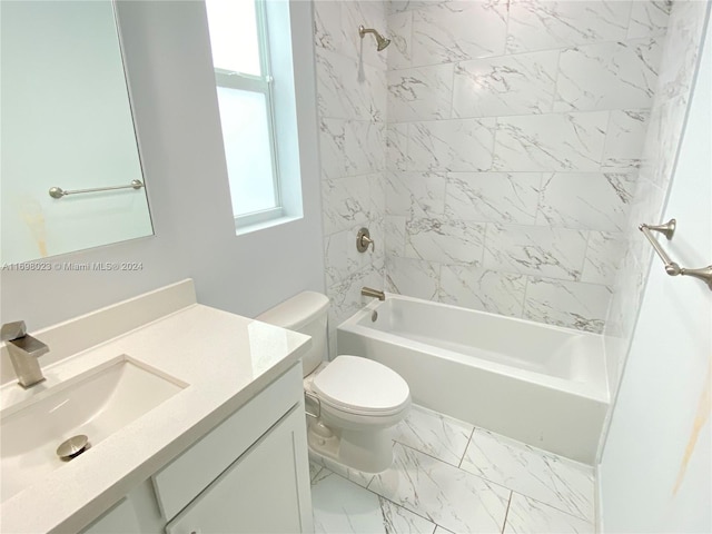 full bathroom featuring vanity, a healthy amount of sunlight, tiled shower / bath combo, and toilet