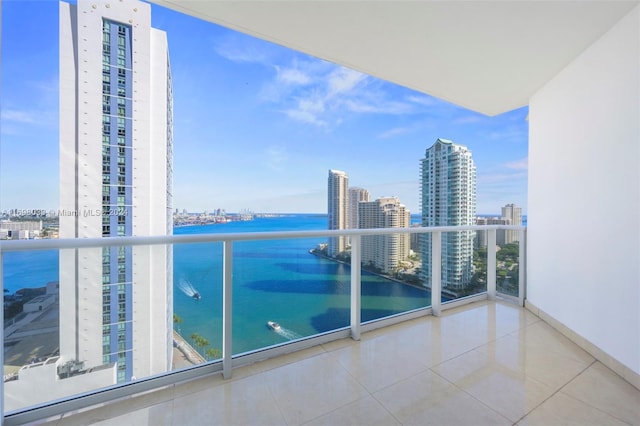 balcony featuring a water view