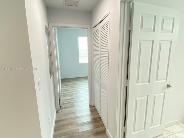 hallway featuring light hardwood / wood-style flooring