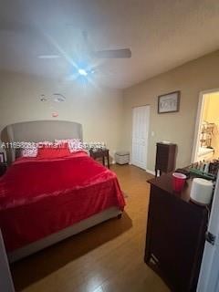 bedroom featuring ceiling fan and hardwood / wood-style floors