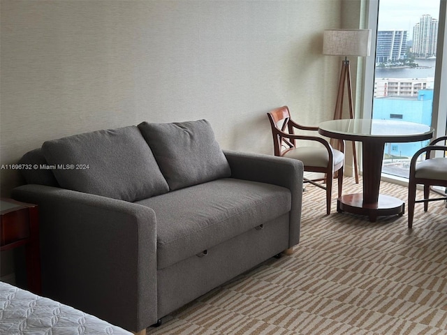 18001 Collins Ave Unit 1204, Sunny Isles Beach, FL 33160 - carpeted living area with plenty of natural light and a view of city