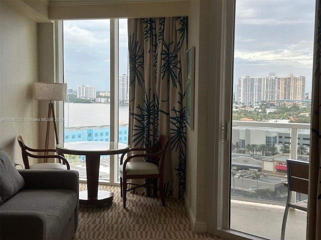 living area featuring a water view