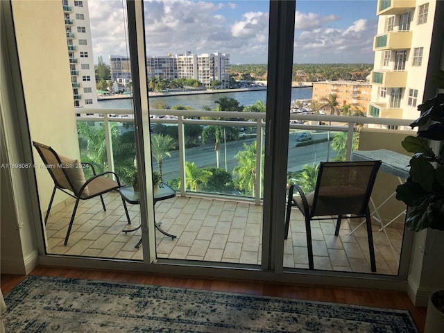 balcony featuring a water view