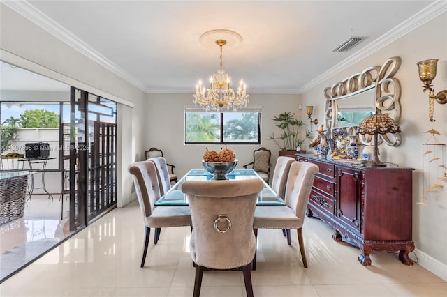 tiled dining room featuring an inviting chandelier and ornamental molding