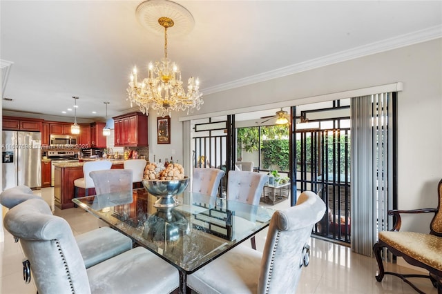 dining space with ceiling fan with notable chandelier, light tile patterned flooring, and crown molding