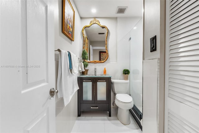 bathroom featuring tile patterned floors, sink, and toilet