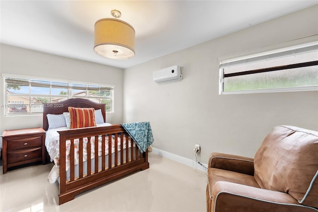 bedroom featuring a wall mounted air conditioner