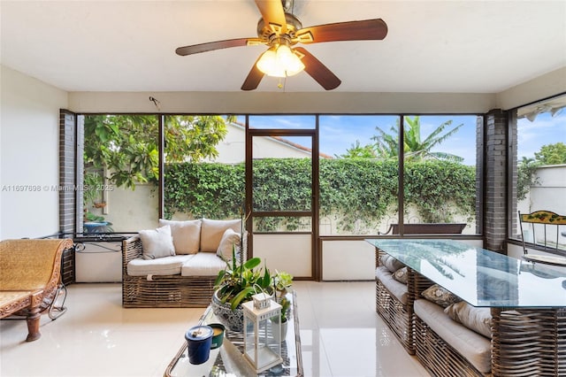 sunroom / solarium with ceiling fan and a wealth of natural light