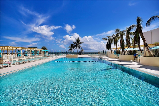 view of swimming pool with a patio area