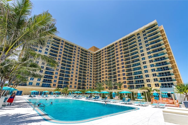 view of pool featuring a patio