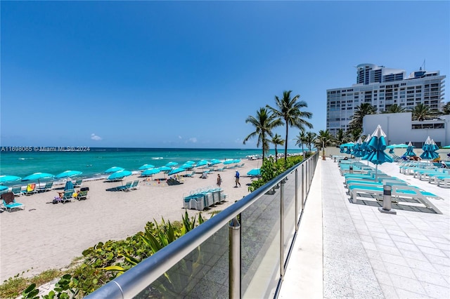 view of water feature with a beach view