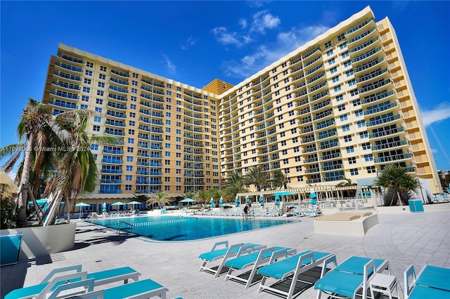 view of swimming pool featuring a patio area