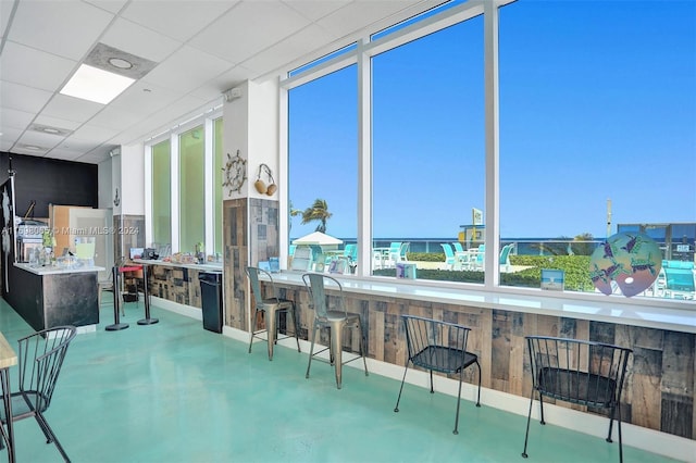 sunroom with a paneled ceiling