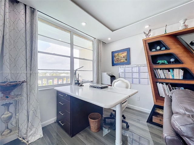 office with dark wood-type flooring