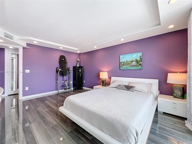 bedroom featuring wood-type flooring