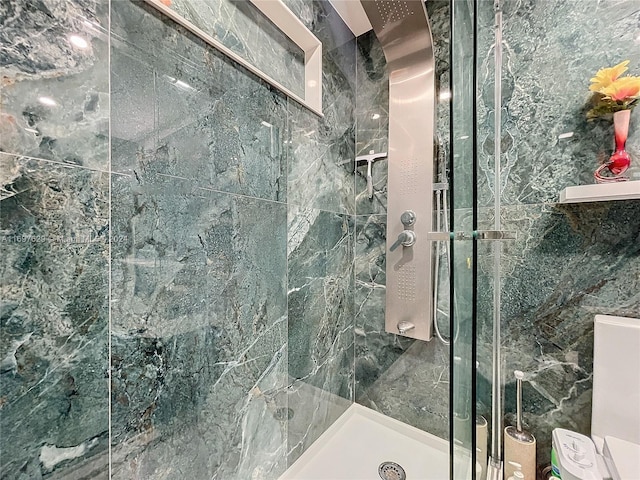 bathroom with an enclosed shower