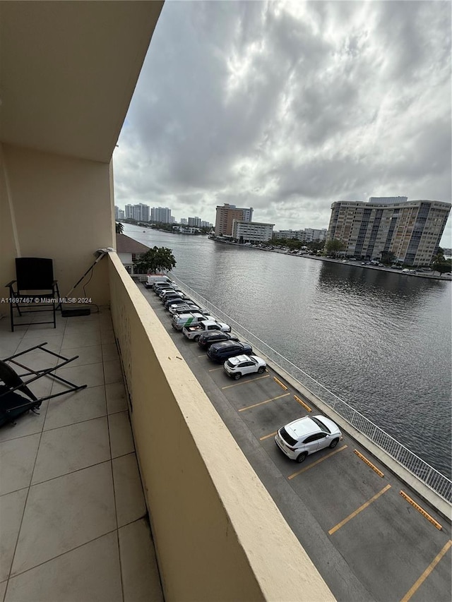 balcony featuring a water view