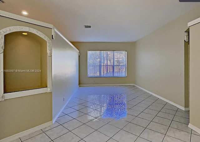 view of tiled spare room