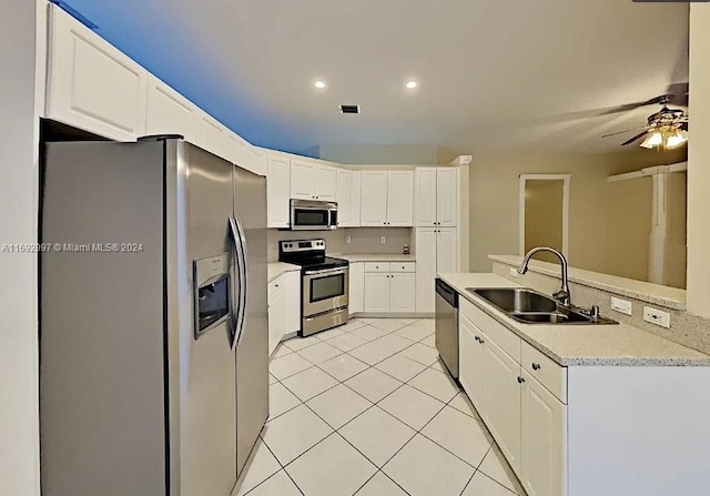 kitchen featuring white cabinets and stainless steel appliances